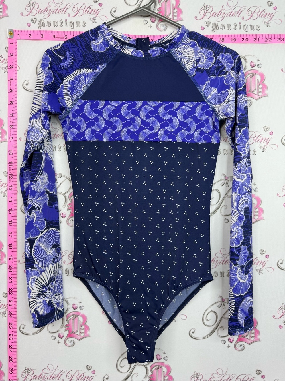 Roxy Long-Sleeve One-Piece Swimsuit in Navy and Purple Floral